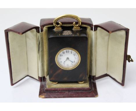 Fine Edwardian gold (15ct) and tortoiseshell cased travelling timepiece with gold swing handle and B.S.F. monogram, white ena