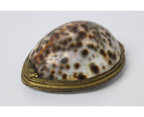 Late 18th / early 19th century Continental enamelled cowrie snuff box with gilt ormolu mount, the hinged cover decorated with