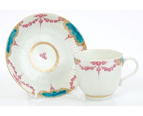 Mid-18th century Worcester fluted coffee cup and saucer with puce floral garlands, gilt and turquoise blue borders   CONDITIO