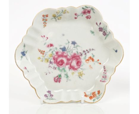 Mid-18th century Worcester polychrome teapot stand with fluted border and painted floral sprays, 14.2cm diameter   CONDITION 