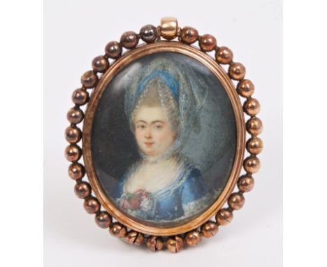 Continental School, mid-18th century - unusual double miniature portrait on ivory - one face depicting a lady in blue lace-li