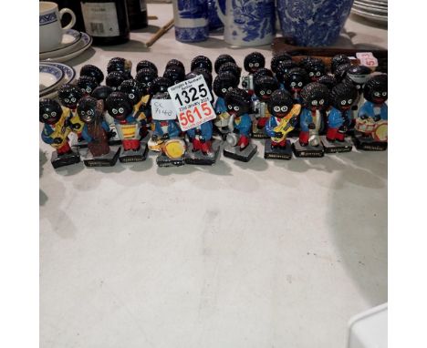 Forty mixed Robertsons golly band figures. Not available for in-house P&P Notice from the the-saleroom.com: These items are l