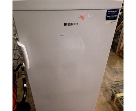 Beko TZ6051W tall free standing freezer, H: 140 cm. All electrical items in this lot have been PAT tested for safety and have