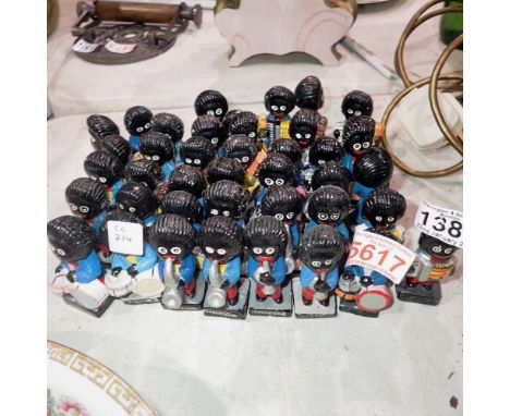 Forty mixed Robertsons golly band figures. Not available for in-house P&P Notice from the the-saleroom.com: These items are l