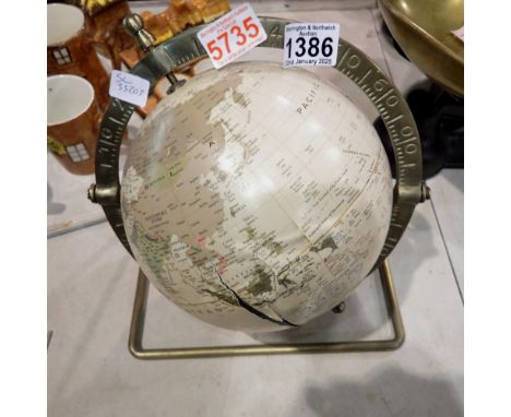 Globe with brass stand and longitude/latitude, surface damage, D: 27 cm. Not available for in-house P&amp;P