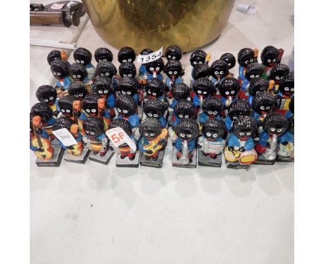 Forty mixed Robertsons golly band figures. Not available for in-house P&P Notice from the the-saleroom.com: These items are l