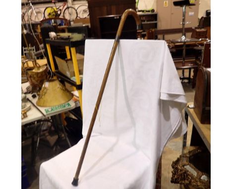 Bentwood walking stick with silver mounts. All electrical items in this lot have been PAT tested for safety and have passed. 
