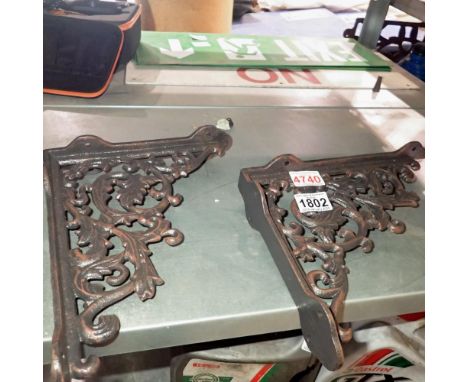 Two cast iron shelf brackets. Not available for in-house P&amp;P 