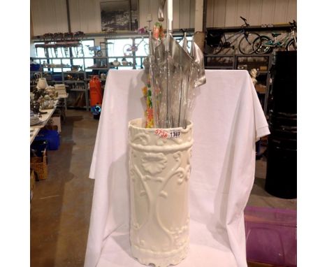 White ceramic umbrella stand with two umbrellas and an ebonised cane. Not available for in-house P&amp;P 