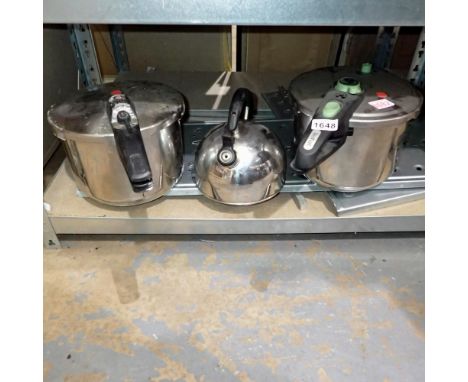 Shelf of mixed metals to include two pressure cookers and a kettle. Not available for in-house P&amp;P 