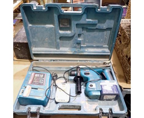 Boxed Makita hammer drill, BHR200. All electrical items in this lot have been PAT tested for safety and have passed. This doe