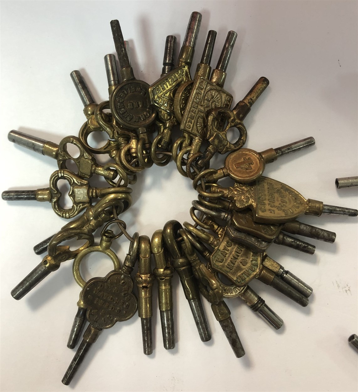 A large collection of decorative pocket watch keys, in Cheffins Fine Art