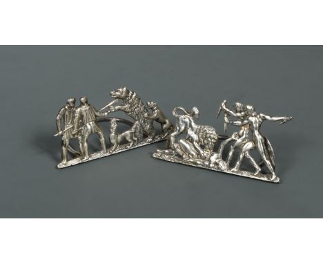 by Hamilton &amp; Inches, 1892, each cast and pierced upright depicting a hunting scene, with simple C shaped hinged stand, 1