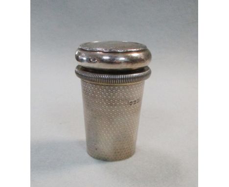 by Charles Henry Dumenil, London 1904, the beaker shaped body covered in engine turned engraving, the friction fitting cover 