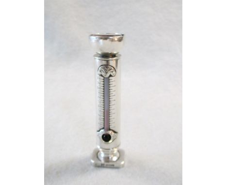 the tubular body with thermometer, the base, of cut cornered rectangular form designed to take an engraved seal (currently va