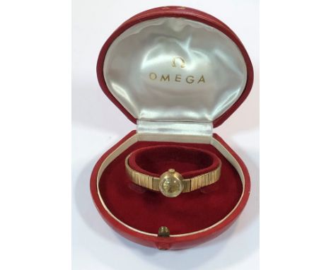 circa 1961, the signed champagne dial, 10mm diameter with gold coloured batons, blued hands and diamond facetted crystal, the