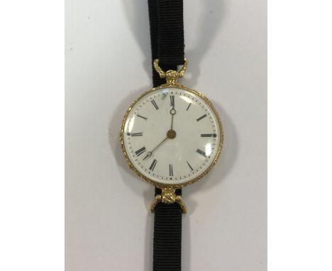 circa 1860, the white dial, 23mm diameter, with black Roman numerals, gold coloured moon hands and chemin de fer chapter ring