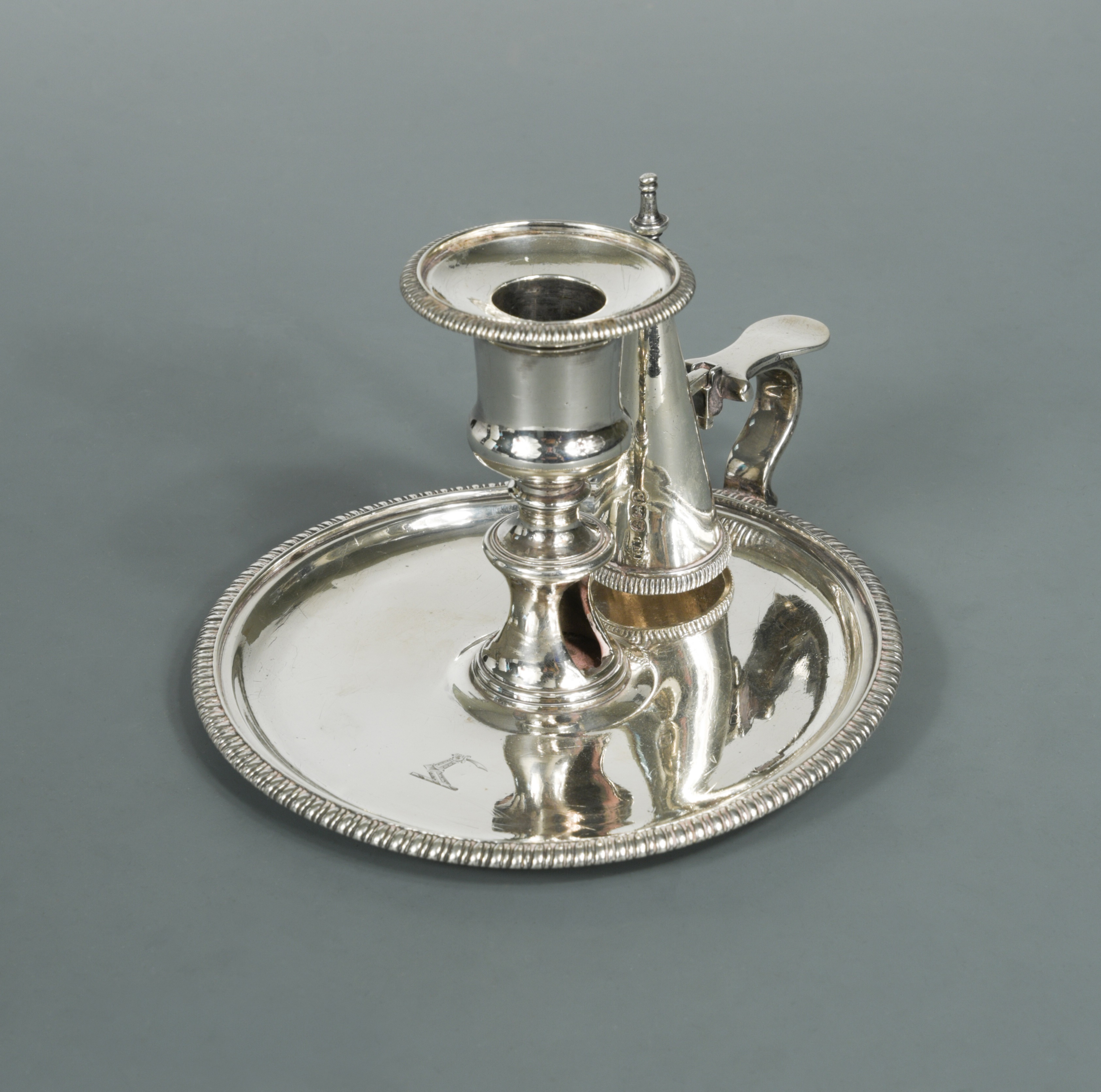 A George III silver chamberstick and snuffer, in - Cheffins Fine Art