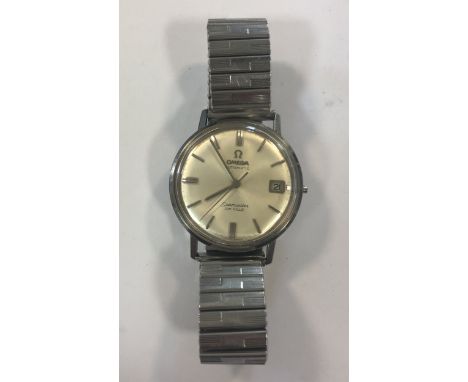 circa 1964, ref. 166.020, the signed and 'double branded' silvered dial, 30mm diameter, with silvered batons, hands and centr