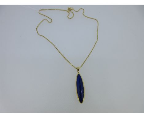 the pendant of navette form with a broad 18ct gold edge, Sheffield hallmarks for 18ct gold, 2012, lap set with a cabochon lap