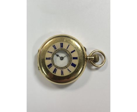 circa 1900, the front lid with blue enamel Roman numerals and chemin de fer chapter ring over a pink guilloché enamel backgro