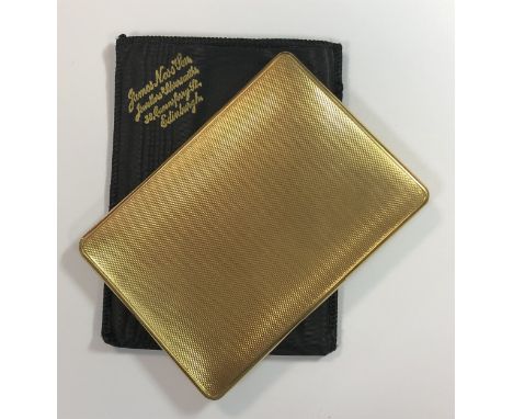 by the Goldsmiths' &amp; Silversmiths' Co, London 1921, of rectangular form, decorated all over with engine turned engraving,