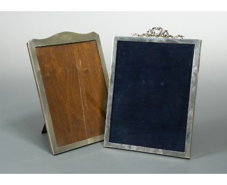 the first, probably by Sanders &amp; MacKenzie, Birmingham 1927 of rectangular portrait form with a slight broken arch top co