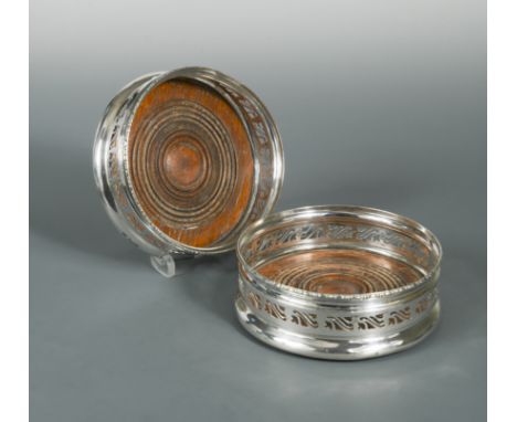 by Mappin &amp; Webb, Birmingham 1938, with pierced and decorated sides under a rim of repeating scroll design, with turned w