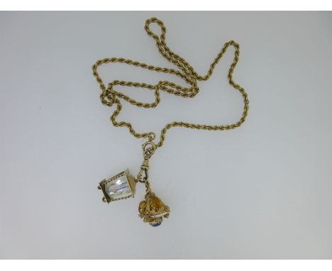 the ropetwist chain with cartouche marked '15', length 59cm, holding a lobster claw clasp suspending a hallmarked 9ct gold la