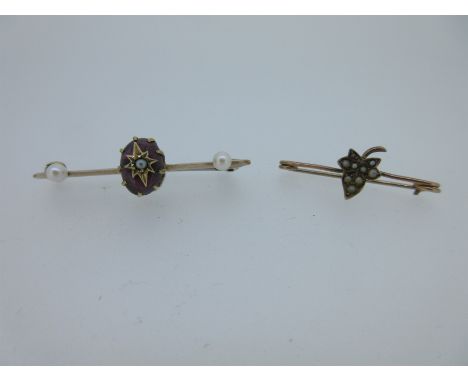 the first a knife edge bar brooch set to the centre with an oval carbuncle garnet with star and seed pearl centre and 3.5mm p