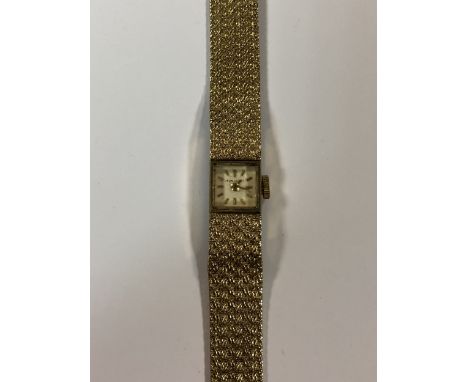 circa 1969, the signed square cream coloured square dial, 4mm diameter, with gold coloured batons and hands, the unsigned 17 