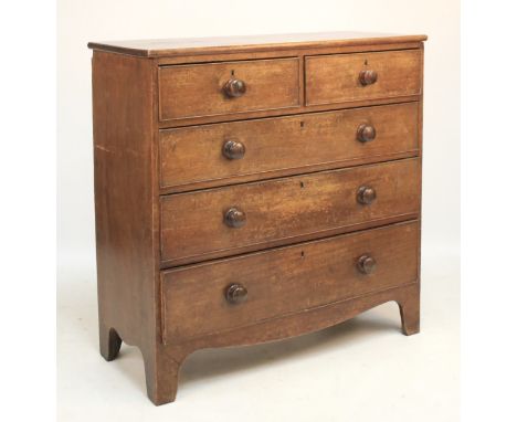 A Georgian mahogany chest of drawers. With two short over three long graduating drawers, with shaped skirt, raise don bracket