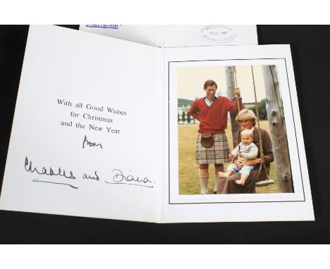 An HRH Charles Prince of Wales and Diana Princess of Wales signed 1983 Christmas Card. The signature autopen machine generate