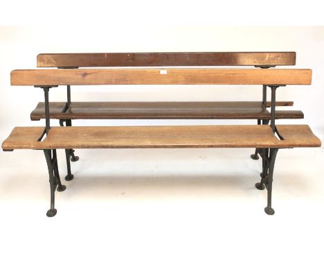 Two 19th century iron and pitch pine tram swingback pew/bench. the cast iron supports stamped Wake & dean London, one in need