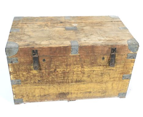 A 19th century / early 20th century metal bound pitch pine military trunk. the rising lid enclosing a tin lined interior, ins
