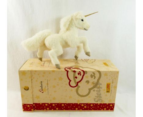 A modern limited edition Steiff unicorn, with ear tag and certificate numbered 00366 (of 1500), 31cm long, with original boxC