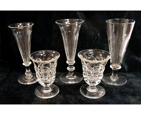 A large collection of assorted glassware comprised of approximately 27 19th century and later drinking glasses, most with pan