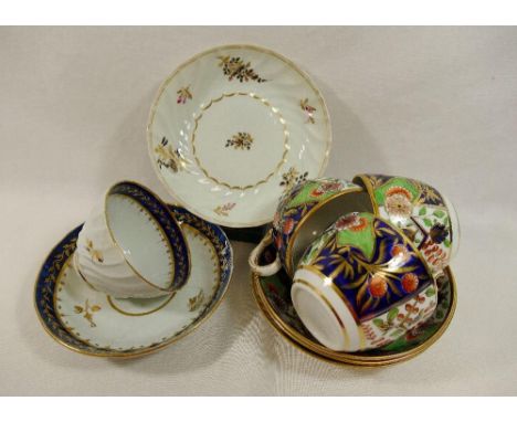 Three Spode teacups and saucers, pattern number 1839, a Chamberlain Worcester porcelain spiral fluted tea bowl and saucer, an