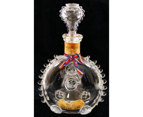 A Remy Martin 'Louis XIII' Cognac glass decanter bottle, designed by Baccarat, with original ribbons, paper labels and etched