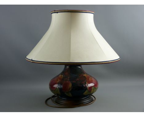 A MOORCROFT 'BIRDS & FRUIT' LARGE BULBOUS SQUAT FORM TABLE LAMP, with Moorcroft lampshade, 29 cms high without shade, 25 cms 