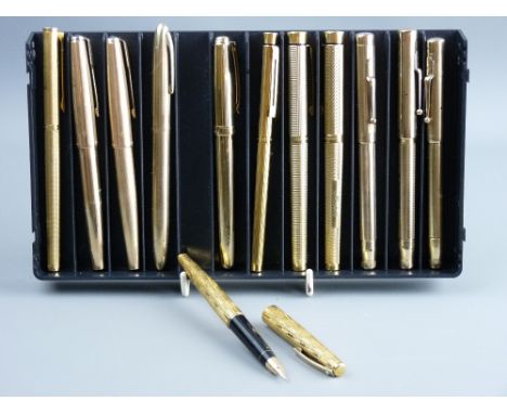 TWELVE GOLD & GOLD COLOURED VINTAGE FOUNTAIN PENS, including a Mabie Todd & Co Swan nine carat gold leverless twist filler, t