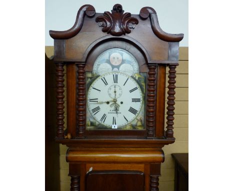 A VICTORIAN MAHOGANY LONGCASE CLOCK by S Bibby, Carnarvon, the painted arched dial set with Roman numerals, Arabic subsidiary