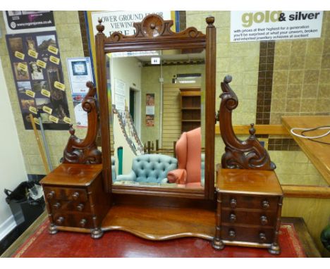 A LATE VICTORIAN MAHOGANY DRESSING MIRROR having dual banks of three small drawers with turned wooden knobs and pillar decora