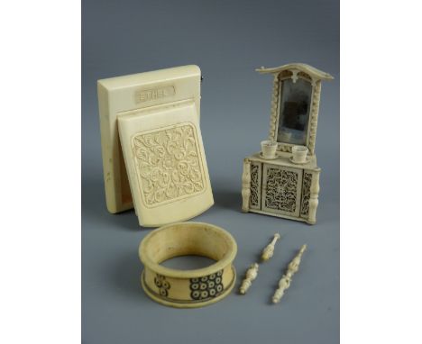 AN IVORY COMPACT, a Napoleonic carved bone ornament and a napkin ring, the lidded compact carved to the top with the word 'Et