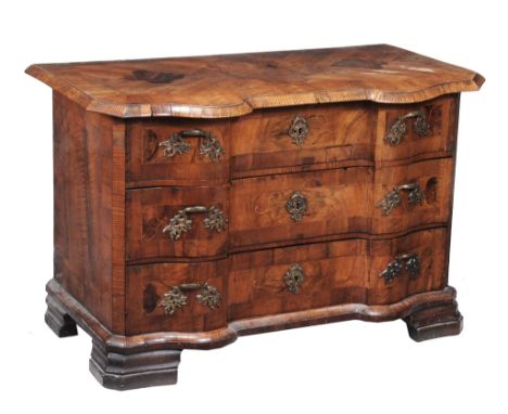 A South German walnut serpentine fronted commode, circa 1750  A South German walnut serpentine fronted commode,   circa 1750,