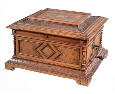 A Swiss carved and marquetry decorated walnut fifteen-inch disc music box  A Swiss carved and marquetry decorated walnut fift