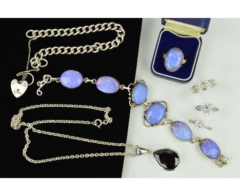 A SELECTION OF SILVER AND WHITE METAL JEWELLERY to include an imitation opal cabochon ring and matching oval cabochon bracele