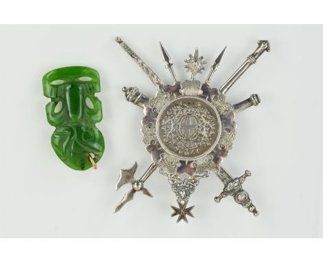 A COIN BROOCH AND A NEPHRITE MAORI JADE TIKI PENDANT, the brooch designed with a central 1796 F.Emmanuel De Rohan coin within