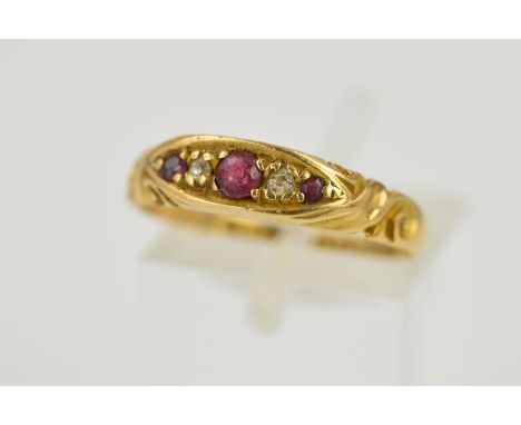 AN EDWARDIAN 18CT GOLD RUBY AND DIAMOND RING, designed as three graduated circular rubies interspaced by two single cut diamo