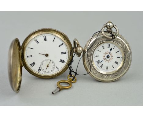 TWO EARLY 20TH CENTURY POCKET WATCHES, both with engine turned detail to the cases, white dials and Roman numeral markers, th